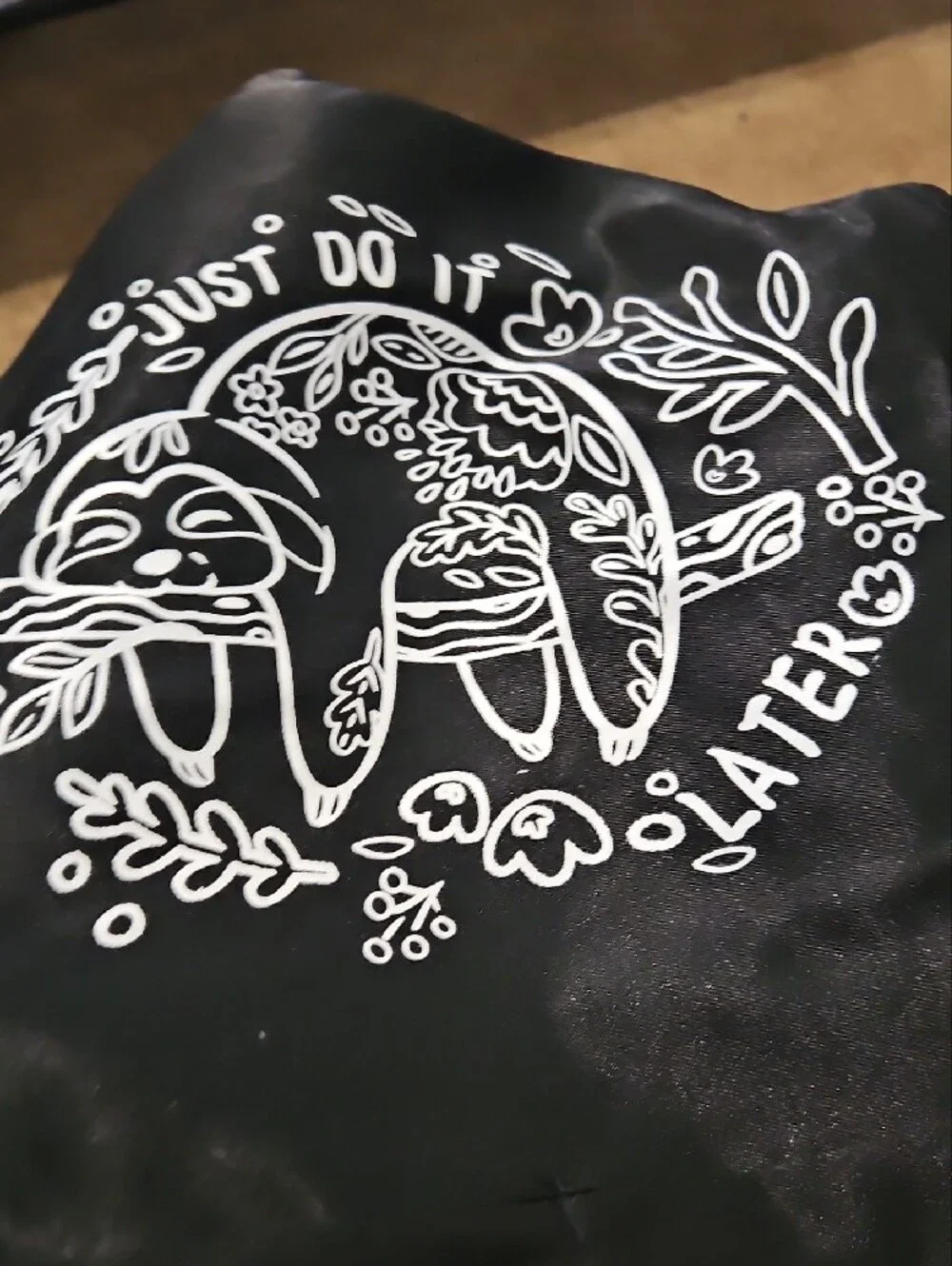 NWT Black Apron with White Sloth Graphic - 